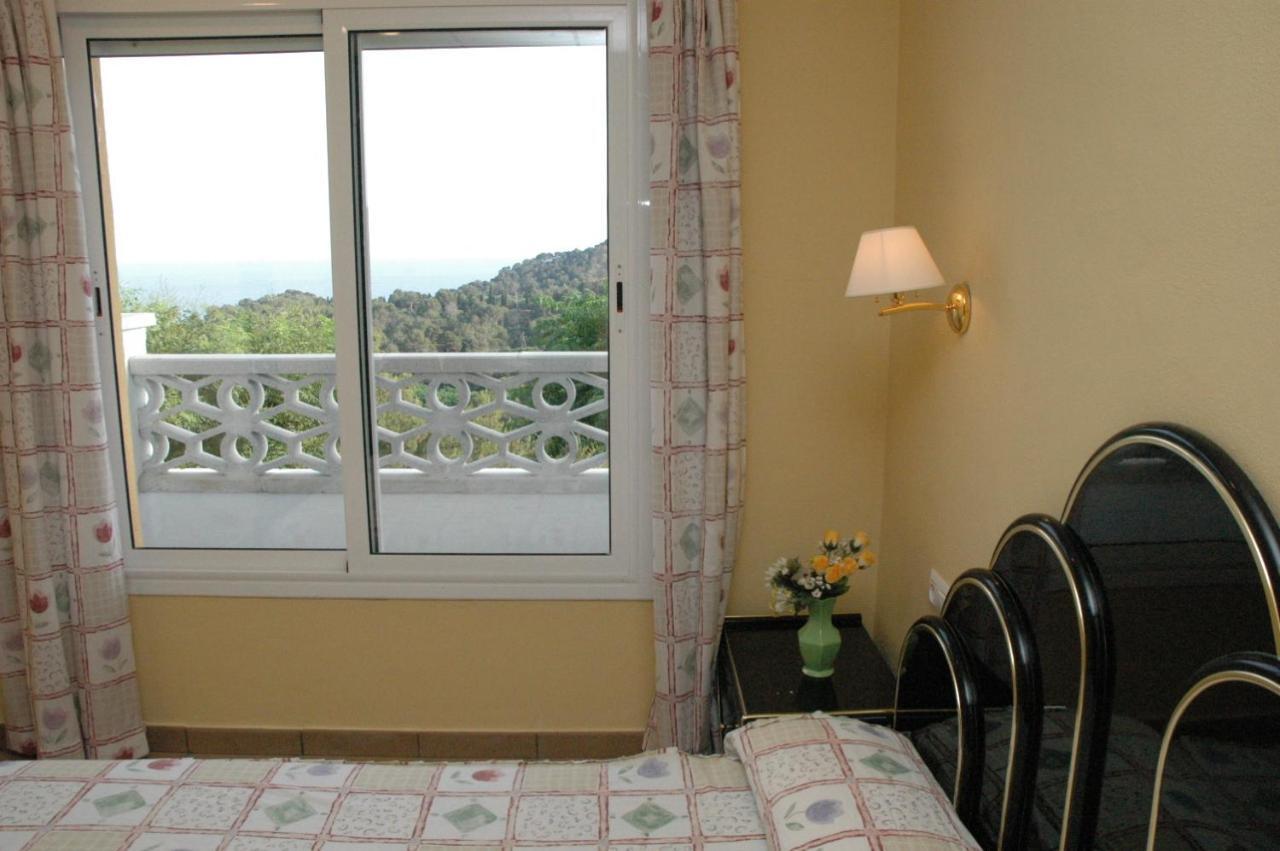 Apartamentos Famara Lloret de Mar Rom bilde